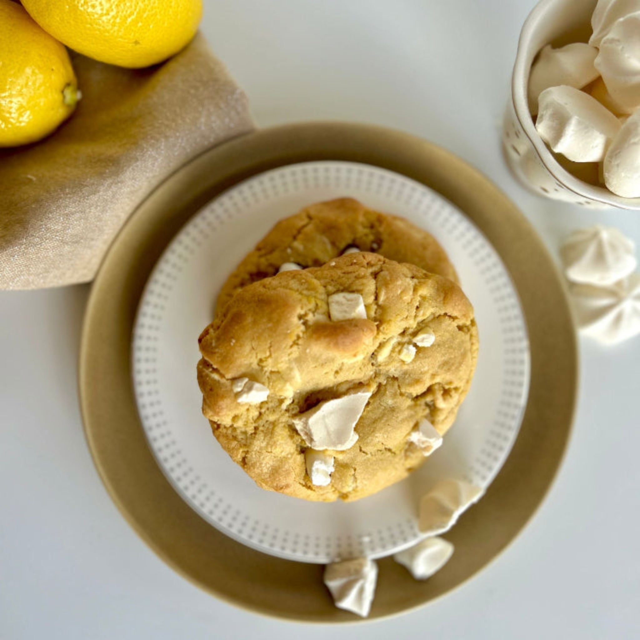 Handmade lemon meringue cookie on white plate