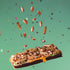 floating brownie with falling clinkers and kitkat pieces