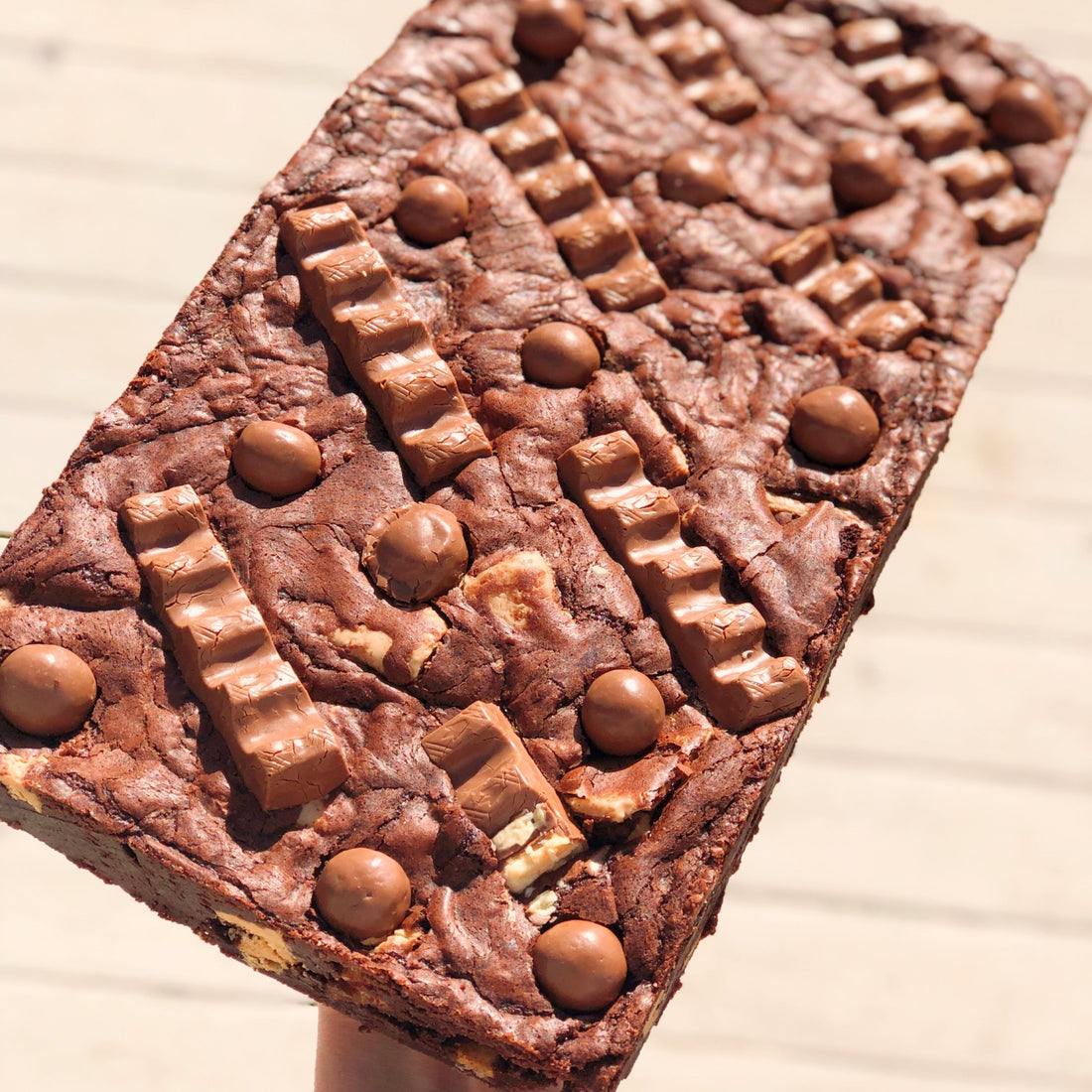 whole brownie slab with kinder bueno and maltesers embedded