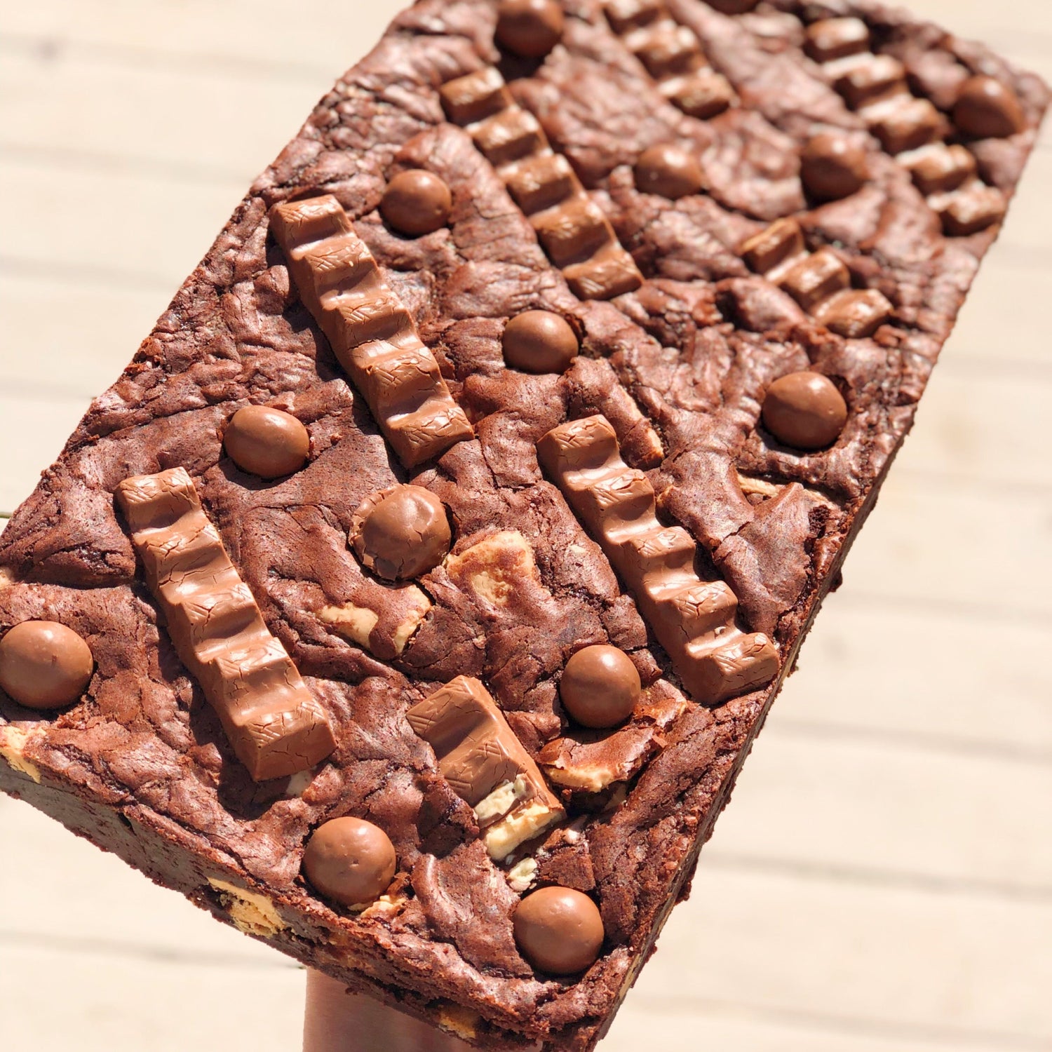 whole brownie slab with kinder bueno and maltesers embedded